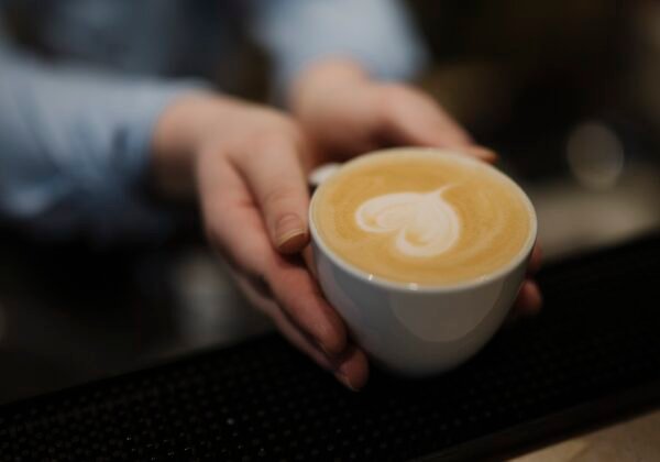 An espresso being poured in a Sydney CBD café