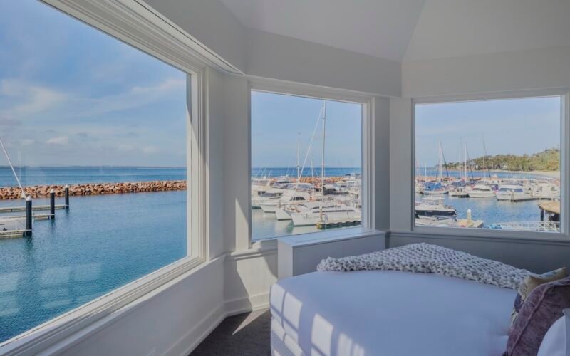 Bedroom with marina view at Anchorage Hotel & Spa, Port Stephens