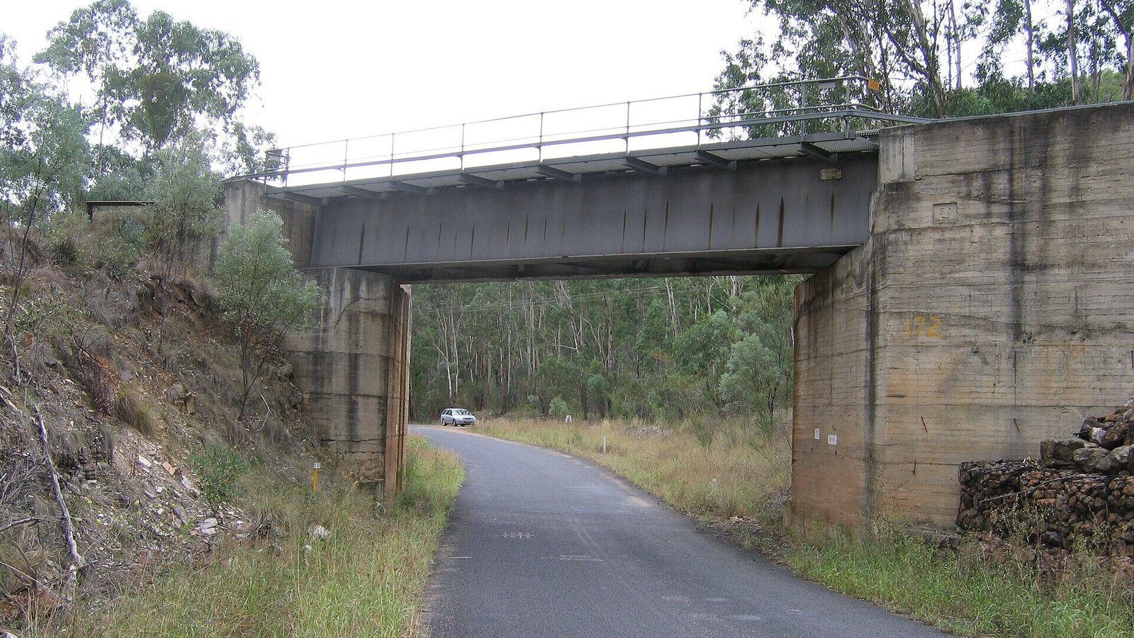 The Bylong Valley Way passing under the rail bridge between the Hunter and Mudgee, NSW