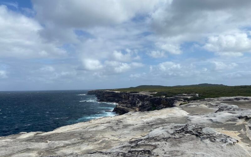 Cliff face and ocean at Cape Solander, Kamay Botany Bay National Park