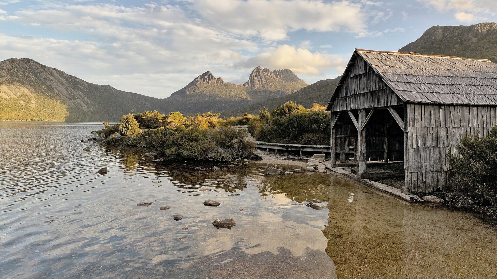 Dove Lake boat shed and Cradle Mountain - AustralianSecret The historic boat shed at Dove Lake beneath Cradle Mountain, Tasmania