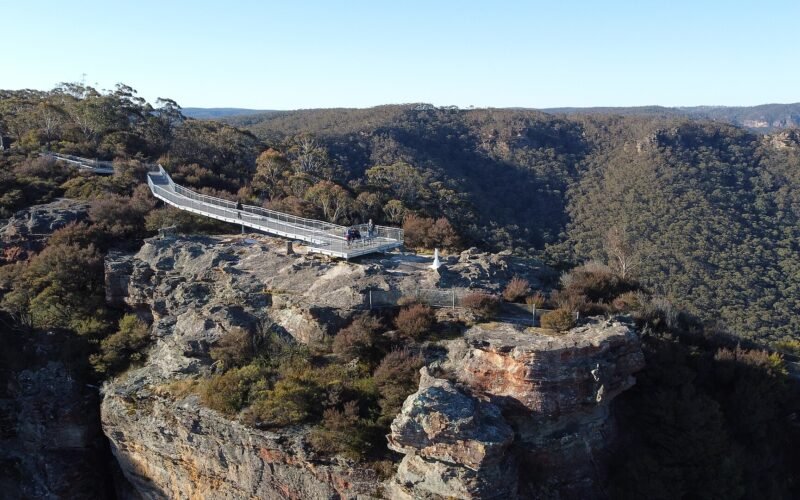 Sandstone cliffs of the Hassans Walls escarpment at sunset, Lithgow