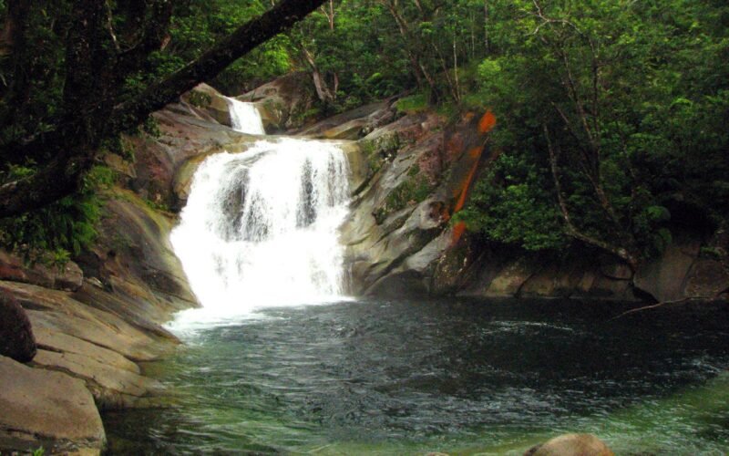 The cascades and swimming pool at Josephine Falls in rainforest, Far North Queensland
