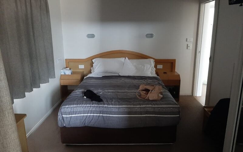 Cabin bedroom interior at Kendalls On The Beach Holiday Park, Kiama