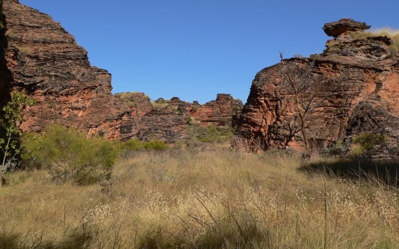 The banded domes of Mirima National Park glowing at low sun, Kununurra WA