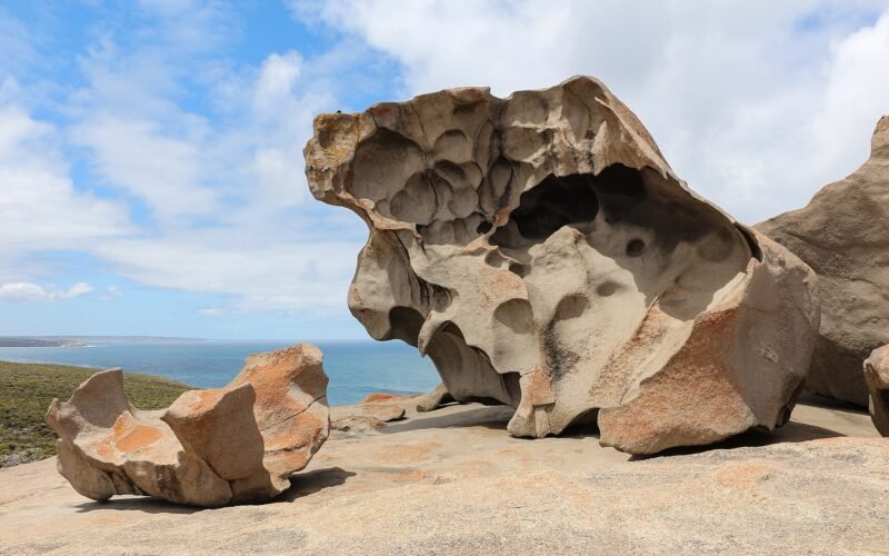 Orange lichen on the granite boulders of Remarkable Rocks above the Southern Ocean