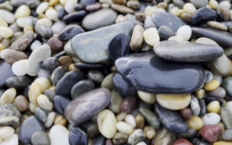 Beach pebbles at Sandy Beach near Smugglers on the Beach, Korora