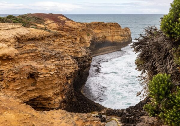 The Grotto rock arch framing the ocean pool, Port Campbell National Park VIC