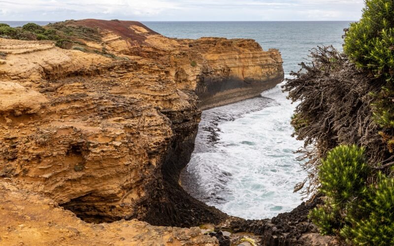 The Grotto rock arch framing the ocean pool, Port Campbell National Park VIC