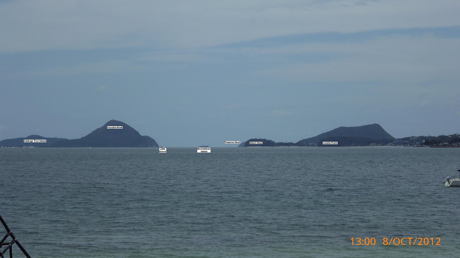 Tomaree Head rising over the entrance to Port Stephens, seen from Salamander Bay